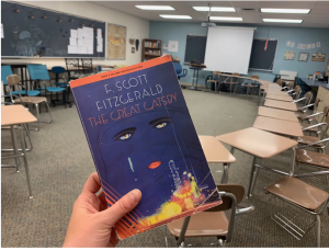 A copy of The Great Gatsby shown in a classroom